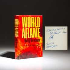 Signed first edition of World Aflame by Billy Graham, inscribed to White House Special Assistant Jack Valenti.