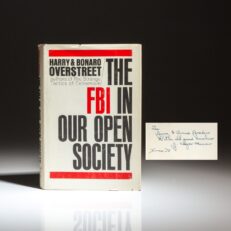 Inscribed by Director the FBI, J. Edgar Hoover, the first edition of The FBI In Our Open Society by Harry and Bonaro Overstreet.