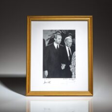 From the Funeral of Thurgood Marshall, an inscribed photograph of Justice David H. Souter and his predecessor, William J. Brennan, entering the Great Hall of the Supreme Court. Justice Souter is holding hands with Brennan, who was unsteady after a recent stroke.