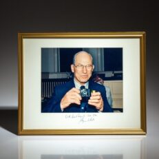 Candid photograph of Justice Byron White taken in the Supreme Court Chambers, inscribed to the chief spokeswoman of the Supreme Court, Toni House.