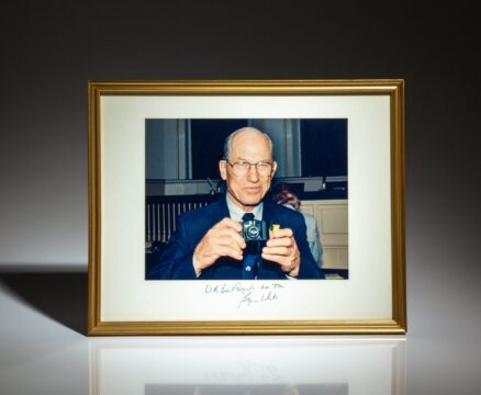 Candid photograph of Justice Byron White taken in the Supreme Court Chambers, inscribed to the chief spokeswoman of the Supreme Court, Toni House.