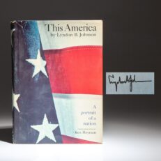 Signed first edition of This America by President Lyndon B. Johnson, with a note from his daughter Lynda stating that this was "one of the last he signed."