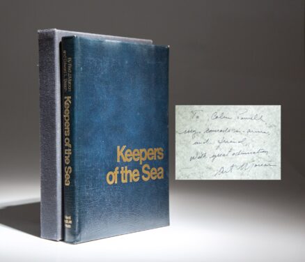 Inscribed to Colin Powell, the deluxe edition of Keepers of the Sea by Fred J. Maroon and Edward L. Beech.