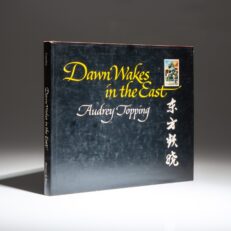 Inscribed to the US Ambassador to China Leonard Woodcock, the first edition of Dawn Wakes in the East by Audrey Topping.