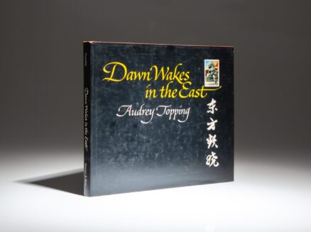 Inscribed to the US Ambassador to China Leonard Woodcock, the first edition of Dawn Wakes in the East by Audrey Topping.