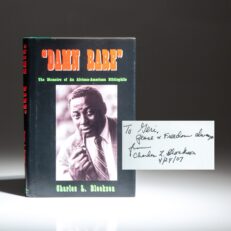 Signed first edition of "Damn Rare" by Charles L. Blockson, a prolific African American historian and collector.