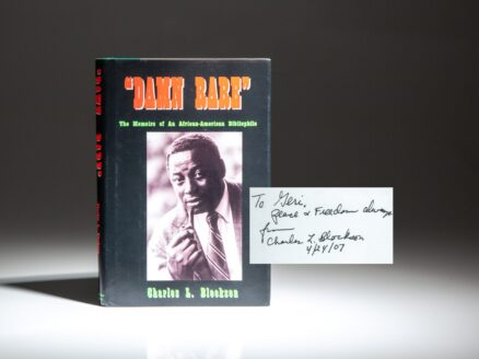 Signed first edition of "Damn Rare" by Charles L. Blockson, a prolific African American historian and collector.