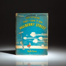 First edition, second state of And To Think That I Saw It On Mulberry Street by Dr. Seuss, in the publisher's scarce dust jacket.