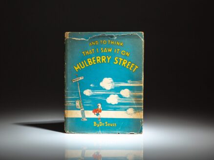 First edition, second state of And To Think That I Saw It On Mulberry Street by Dr. Seuss, in the publisher's scarce dust jacket.