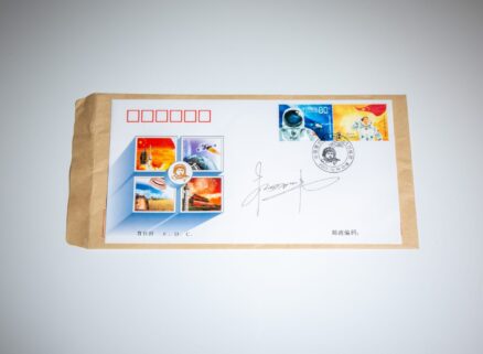 The first manned spaceship from China, the Shenzhou 5 Commemorative Stamps, signed by the first Chinese astronaut, Yang Liwei.